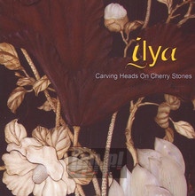 Carving Heads On Cherry Stones - Ilya