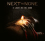 A Light In The Dark - Next To None